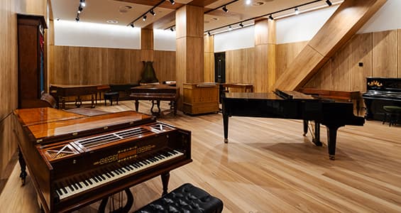 A studio with multiple pianos