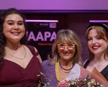 Photo of the two winners of the 2024 Taryn Fiebig Award, ECU Bachelor of Music student Michelle Pryor and Bachelor of Arts (Music Theatre) student Hanna Bourke on either side of Director of The Humanity Foundation Talya Masel 