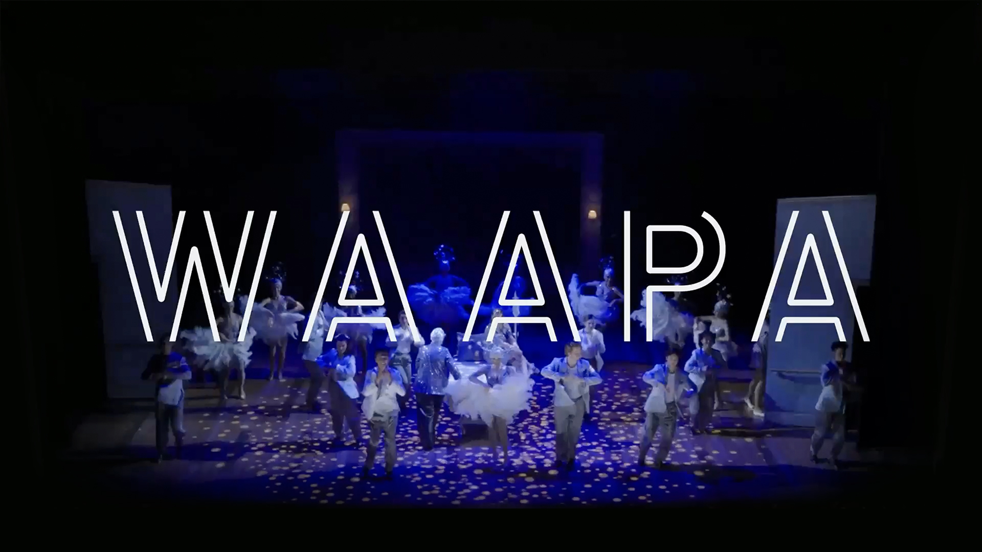 Dancers wearing blue and white on a stage with the word WAAPA overlayed on top